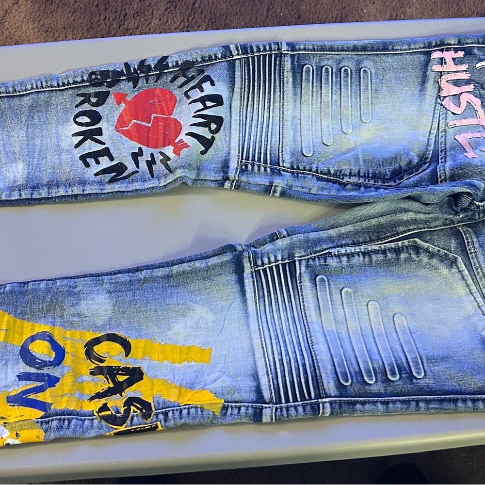 Graphic Distressed Jeans with Bold Text